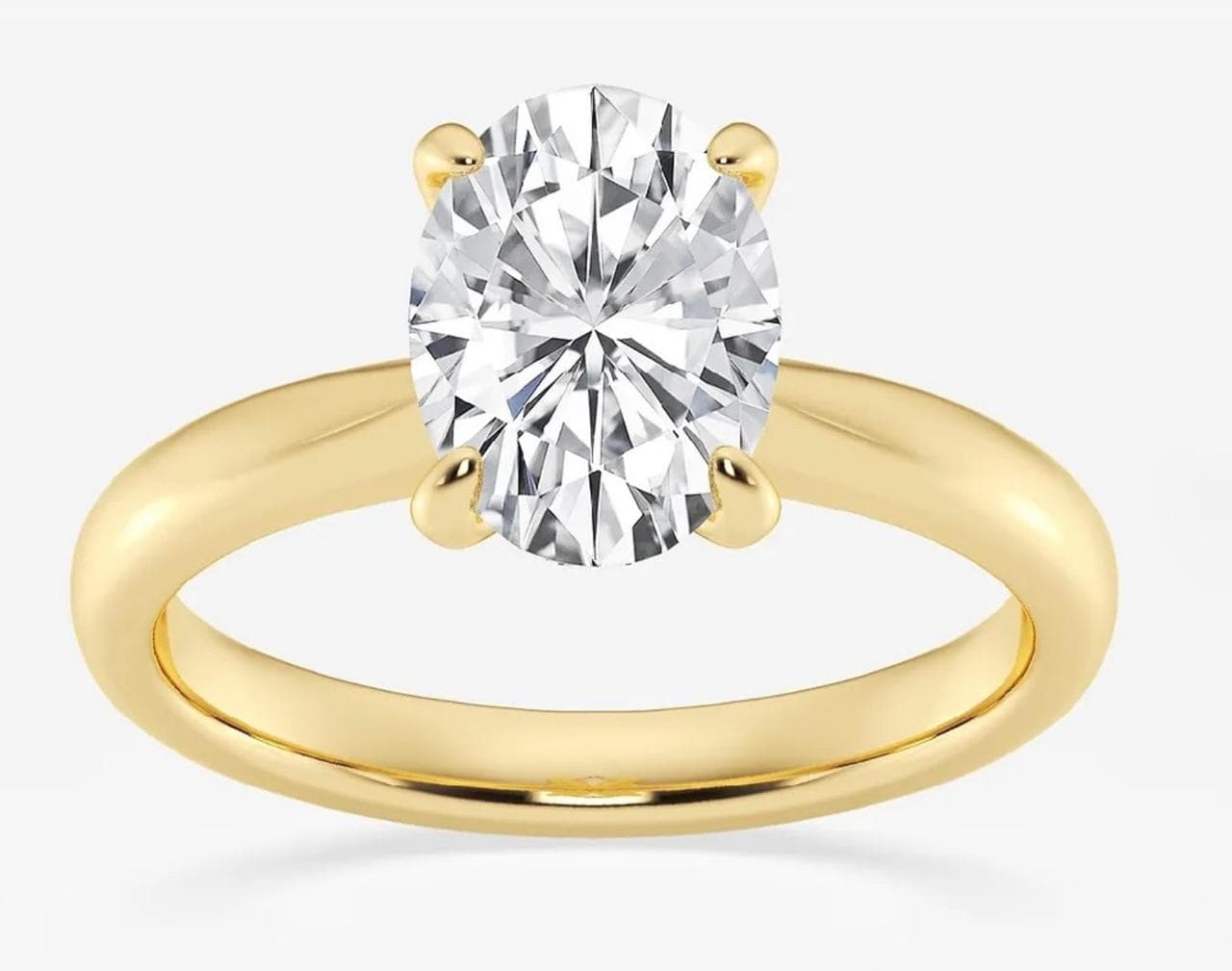 Oval Solitaire Ring in Yellow Gold